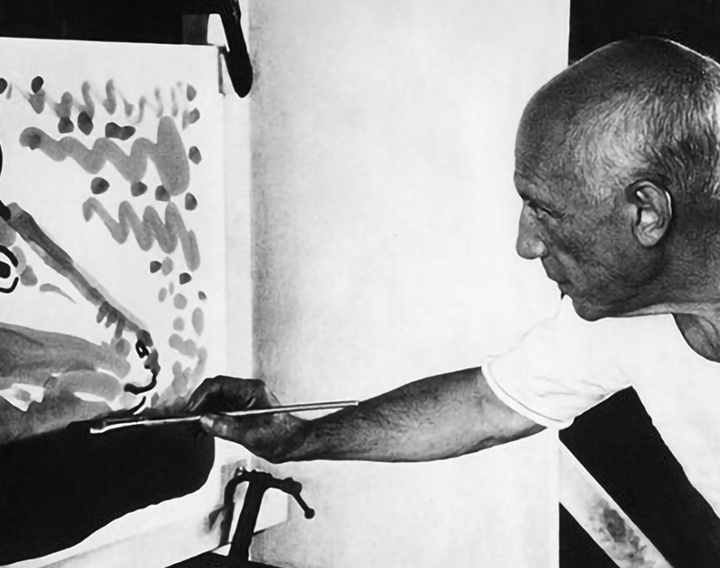 Examining rooster-themed paintings by Pablo Picasso