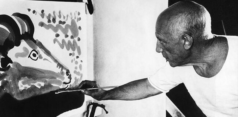 Examining rooster-themed paintings by Pablo Picasso