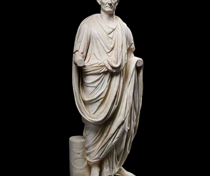 man dressed in a roman toga called the orator