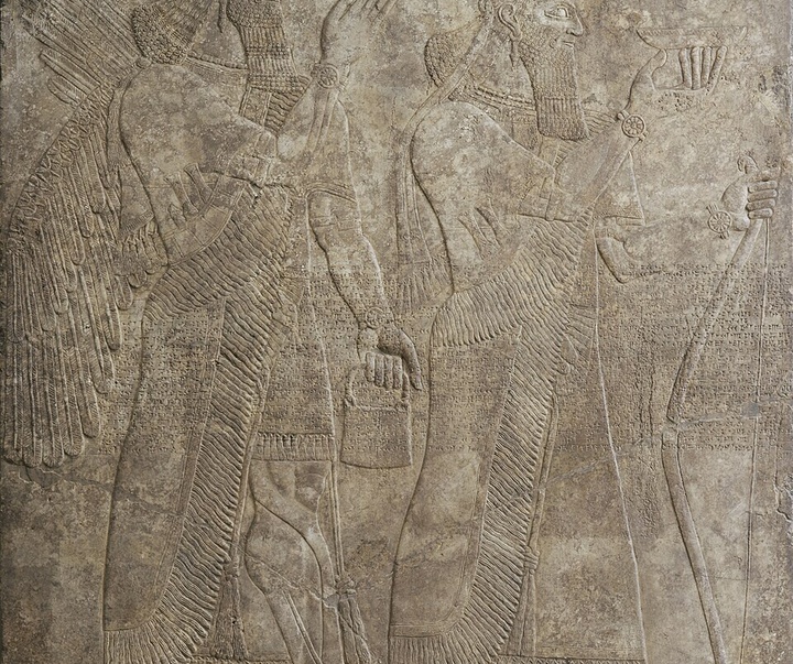 ashurnasirpal ii and a winged deity northern iraq