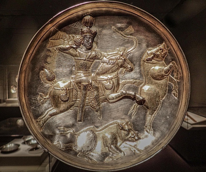 plate depicting a boar hunt persia iran sasanian period 4th ce